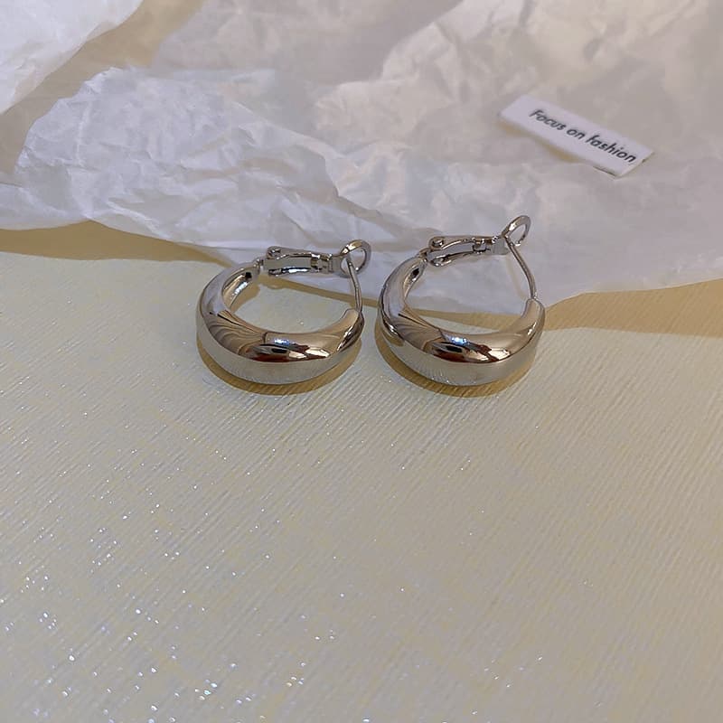 Silver Polished Dome Huggie Clip-on Earring — front view