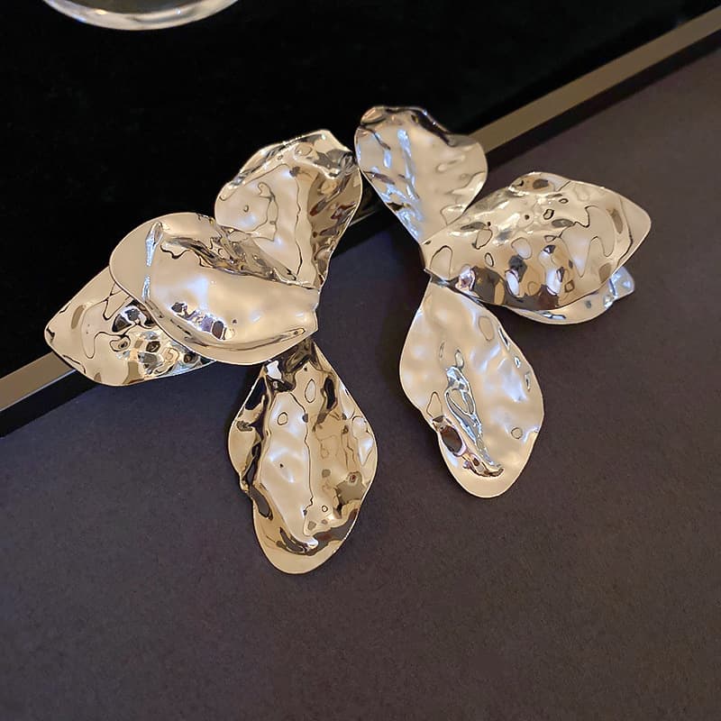 Silver Hammered Bow Petal Stud Earring — front view