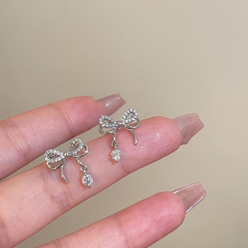 Silver Crystal Bow Drop Stud Earring — front view