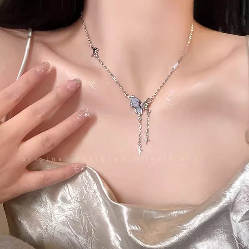 Silver Starburst Butterfly Tassel Necklace — Necklace pendants from Mowey Studio