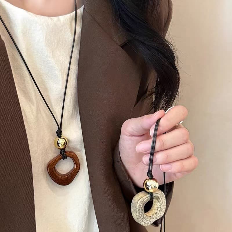 White Imitation Bone Ring Cord Long Necklace — front view