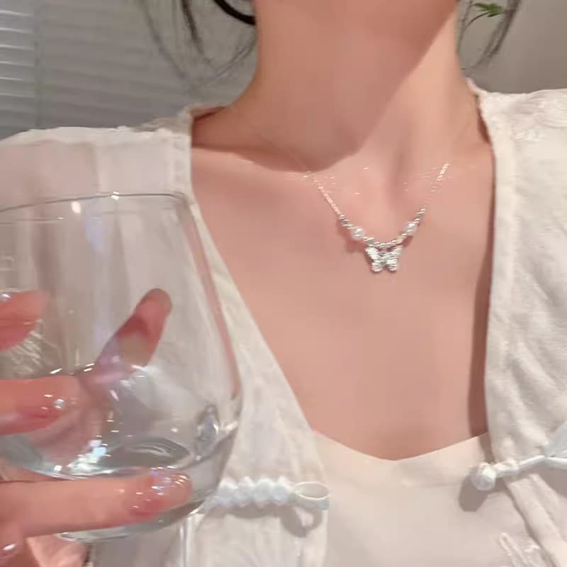 Silver Pearl Thick Butterfly Pendant Necklace — front view