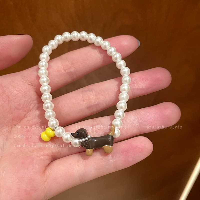 White Pearl Dachshund Dog Charm Bead Bracelet — front view