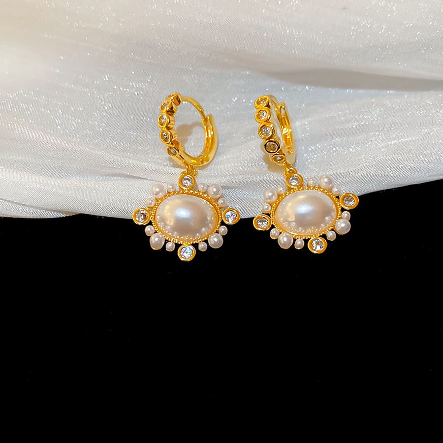 Gold Sunburst Crystal Pearl Clip-on Earring — front view