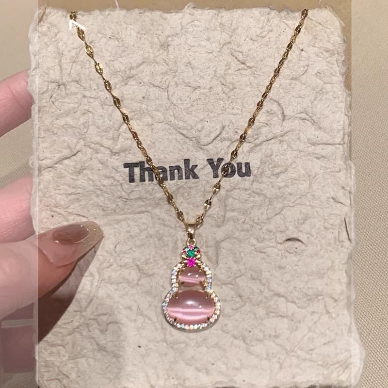 Gold Pink Gourd Cat Eye Pendant Necklace — front view