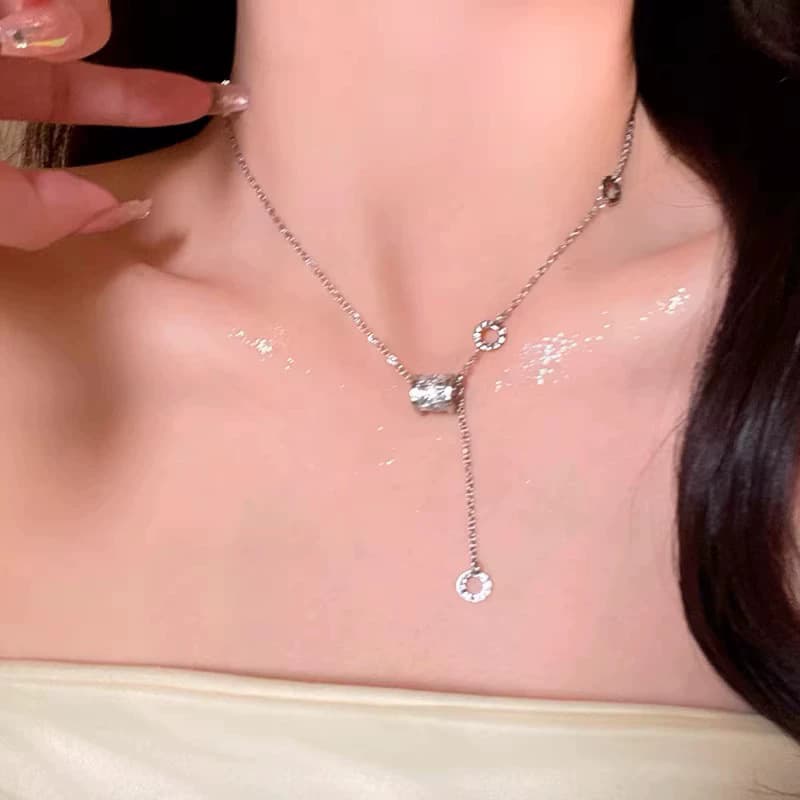 Silver Hourglass CZ Lariat Tassel Necklace — front view