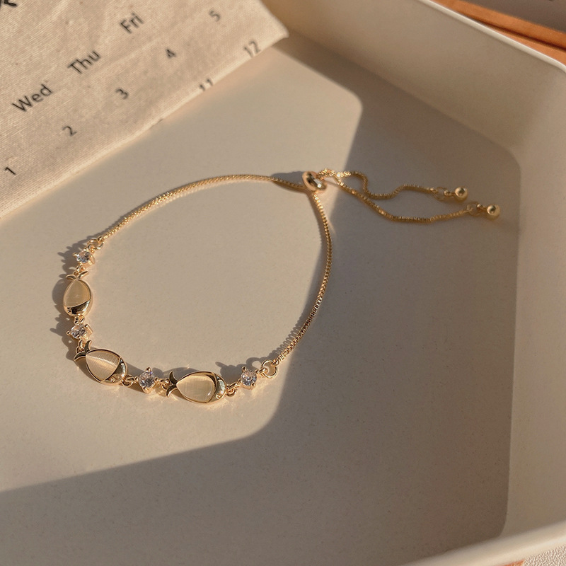 Gold Opal Fish Charm Bracelet