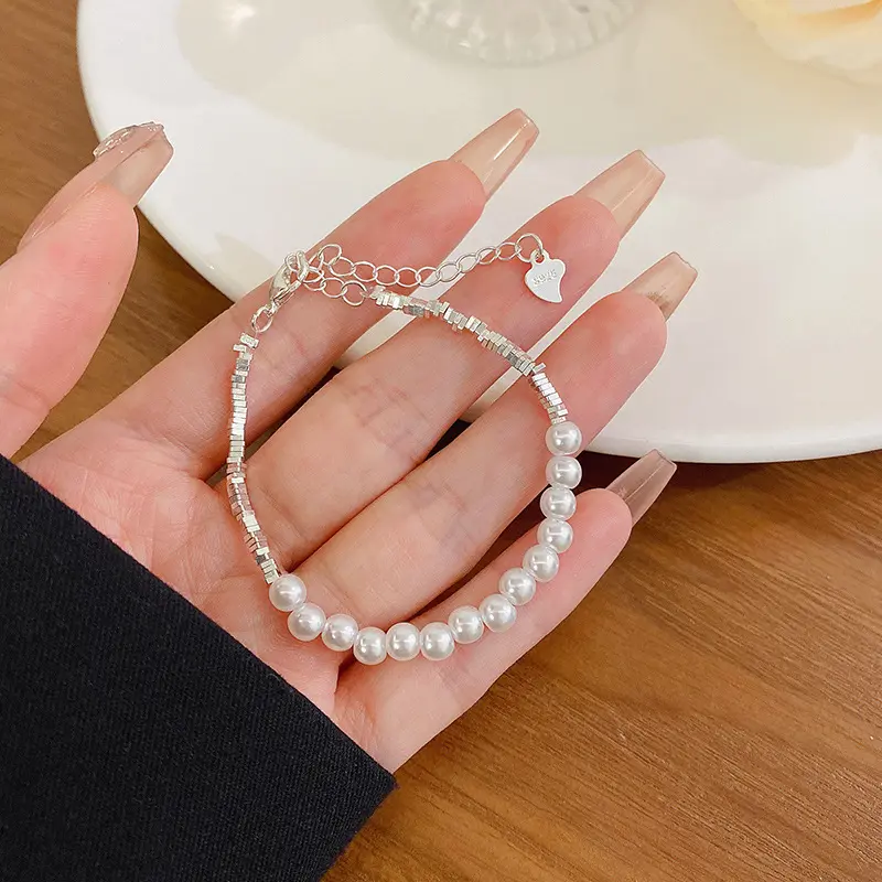 Silver Crushed Bead and Pearl Mixed Bracelet — front view