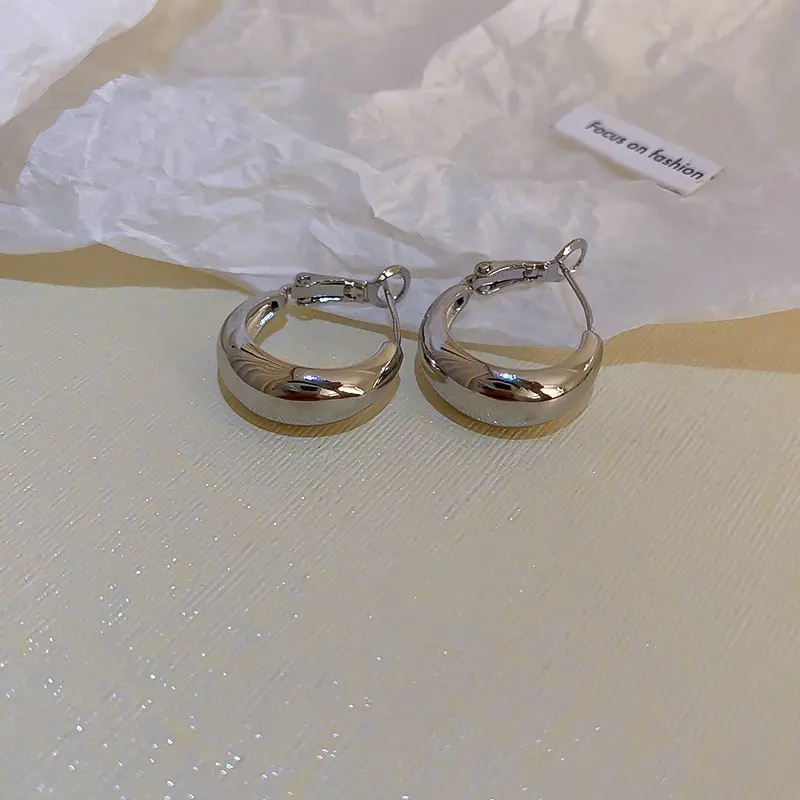 Silver Polished Dome Huggie Clip-on Earring — front view