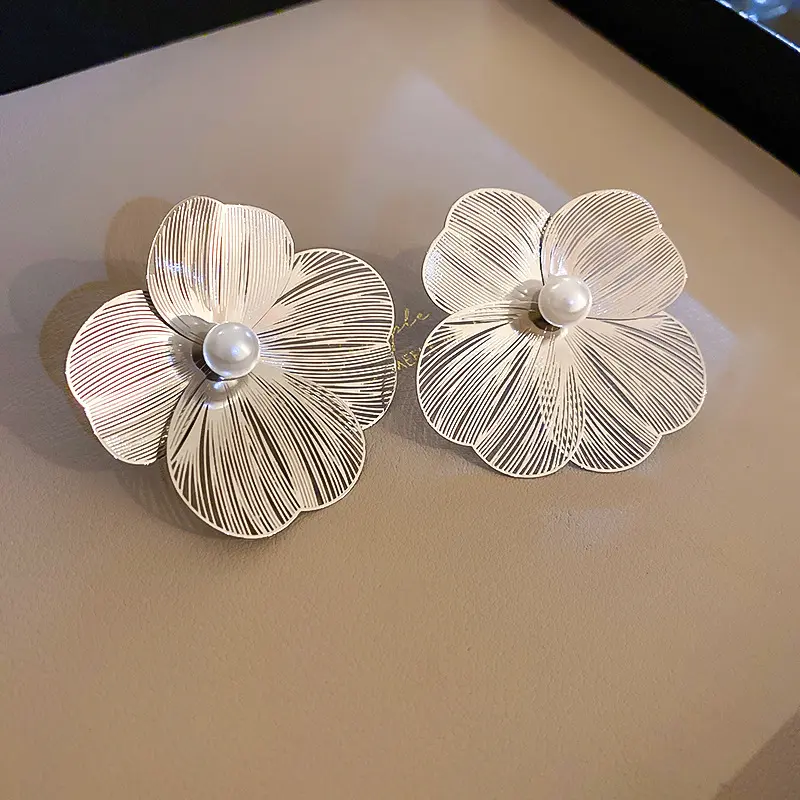 Silver Striped Petal Flower Pearl Centre Stud Earring — front view