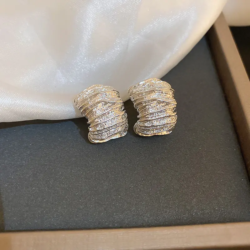 Silver Crystal-Threaded Layered Arc Stud Earring — front view