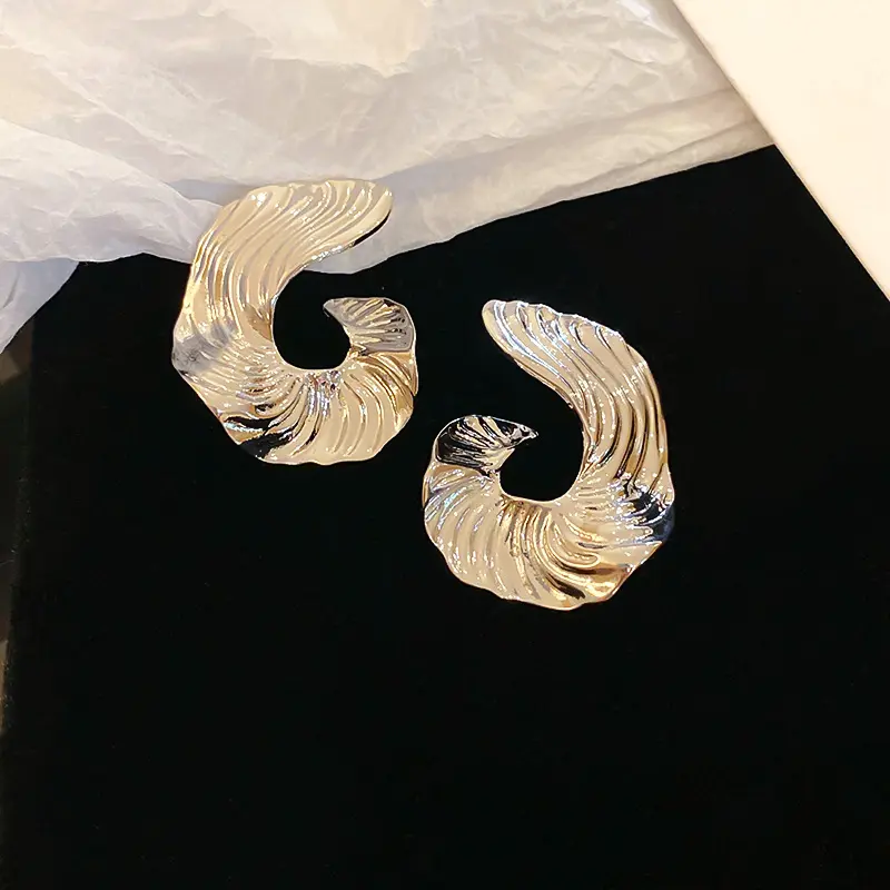 Silver Ribbed Spiral Swirl Stud Earring — front view