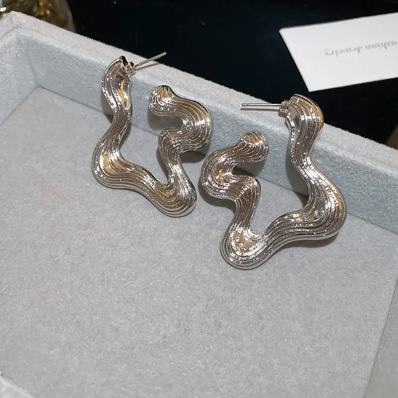 Silver Ridged Wavy Ribbon Stud Earring — front view