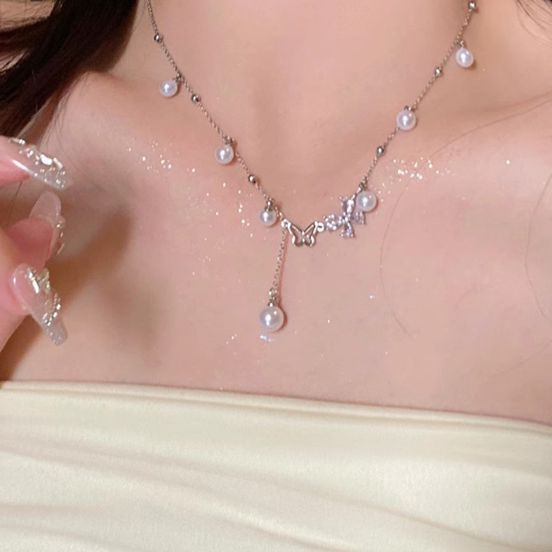 Silver Pearl Butterfly Bow Tassel Necklace