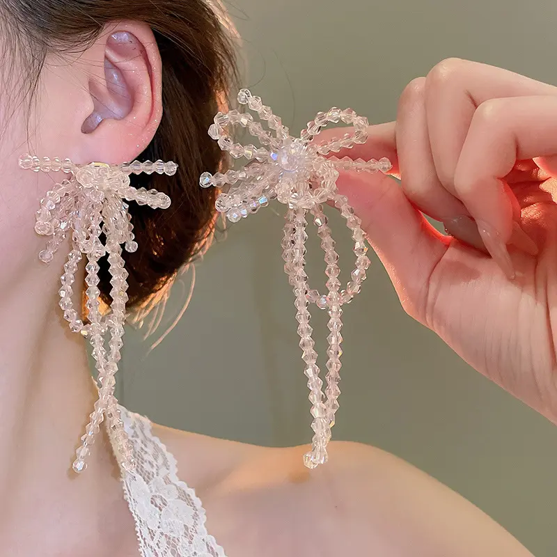 Aurora Crystal Bow Tassel Drop Earring — front view
