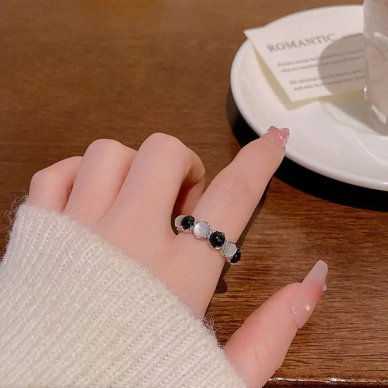 Silver Black and White Cat Eye Stone Band Ring — front view