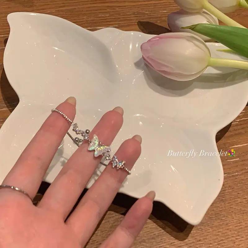 Silver Opal Butterfly Star Charm Bracelet — Bracelet charms from Mowey Studio