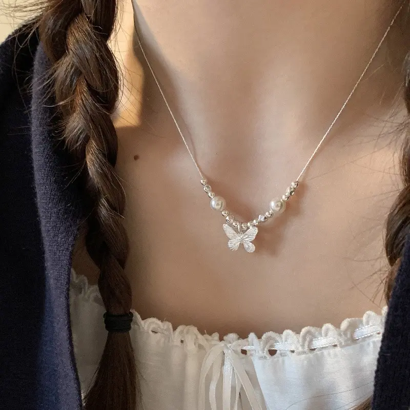 Butterfly Pearl Arc Necklace — Necklace pearls from Mowey Studio