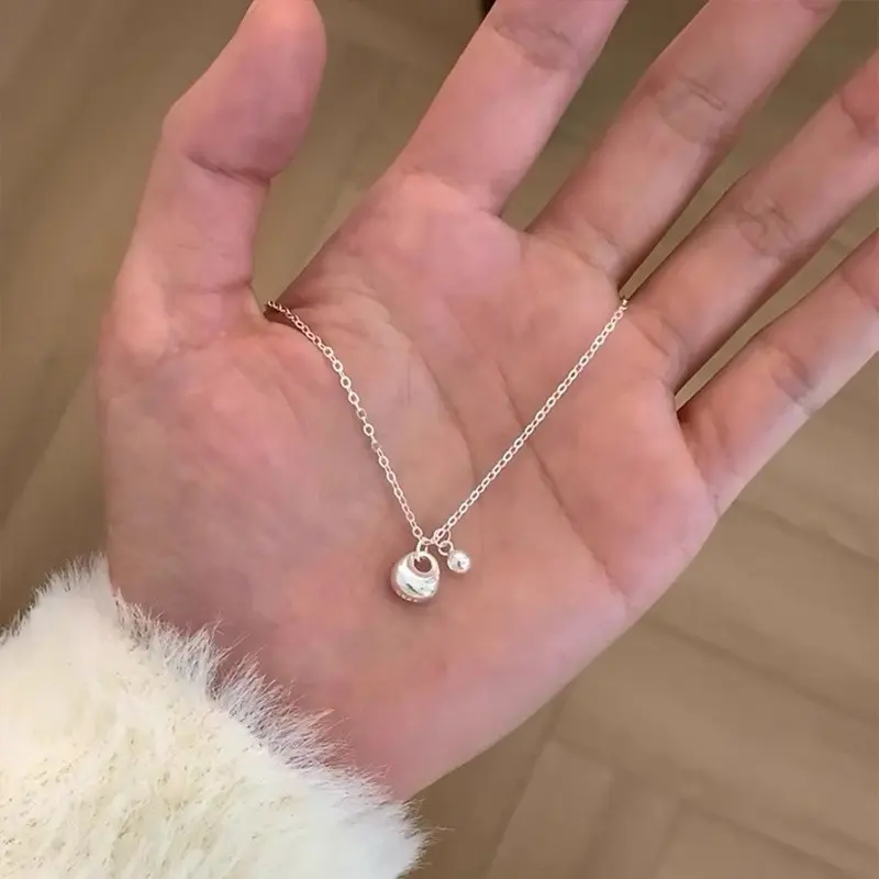 Hammered Orb Ball Pendant Necklace — front view