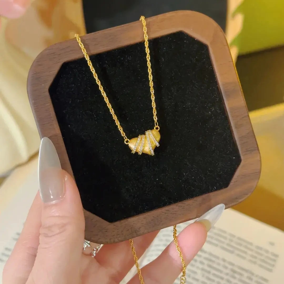 Gold Croissant CZ Stripe Necklace — front view