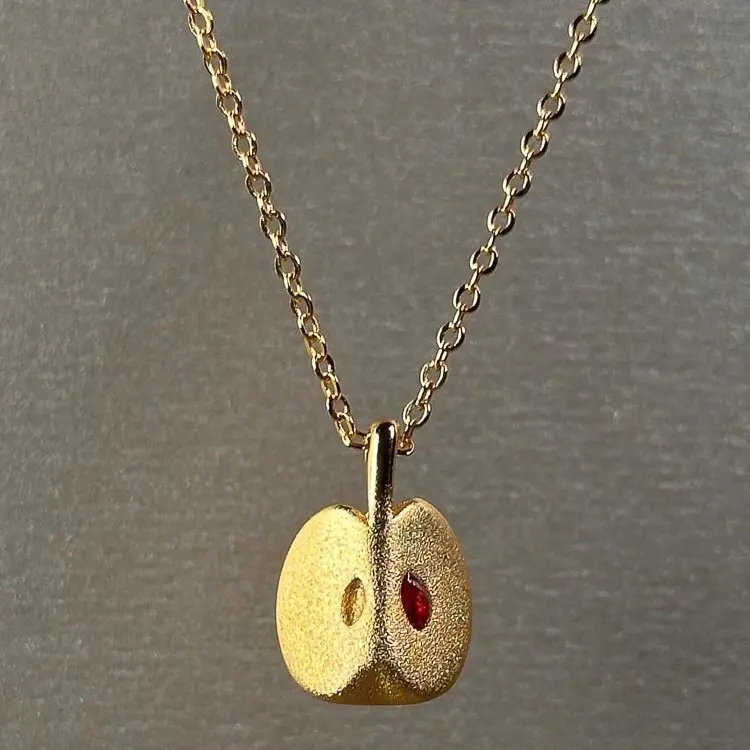 Gold Apple Disc Red Stone Necklace — front view