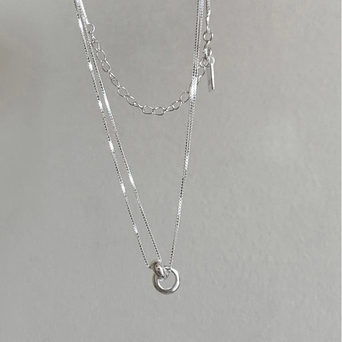 Dual Chain Circle Charm Necklace — front view