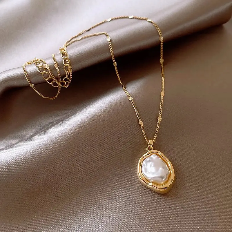 Gold Baroque Pearl Frame Pendant Necklace — front view