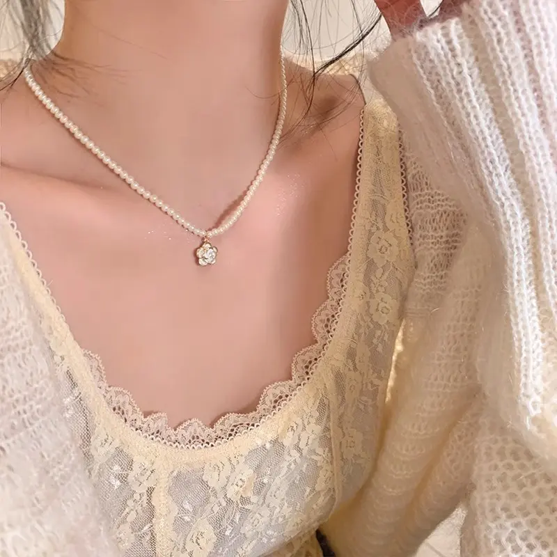 Gold Pearl Woven Camellia Chain Necklace — front view