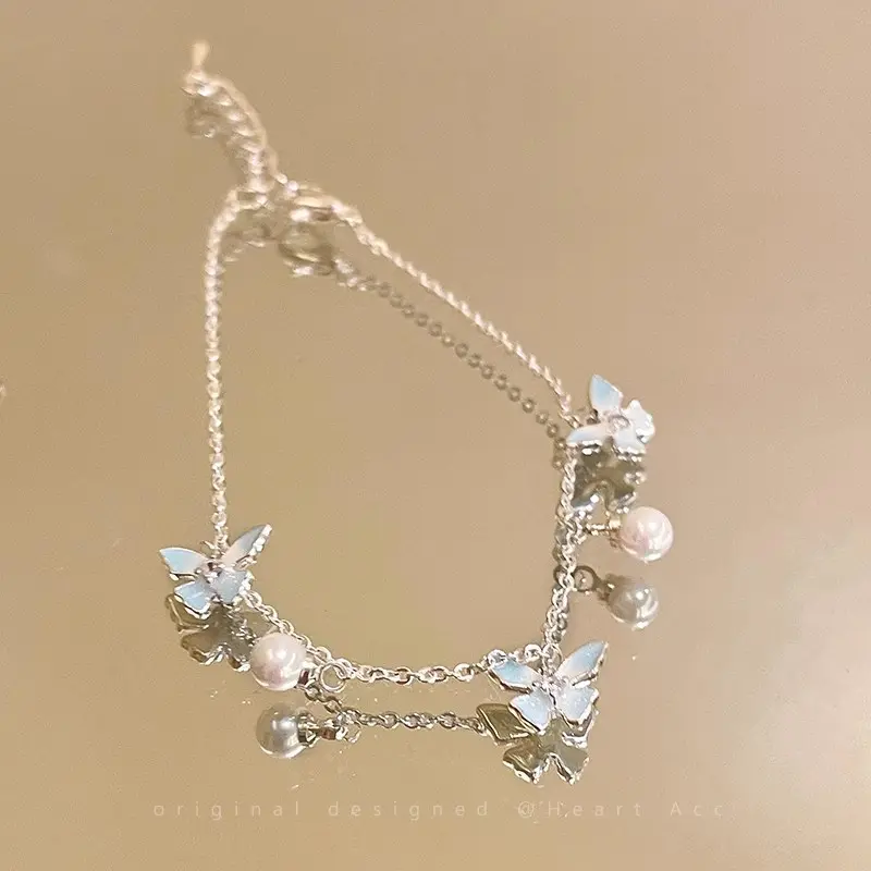 Mint Blue Butterfly Pearl Drop Layered Bracelet — front view