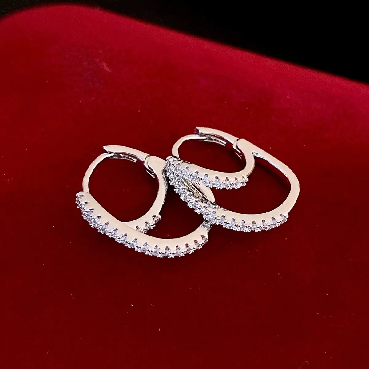 Silver Crystal Pavé Curved Square Huggie Hoop Earring — front view