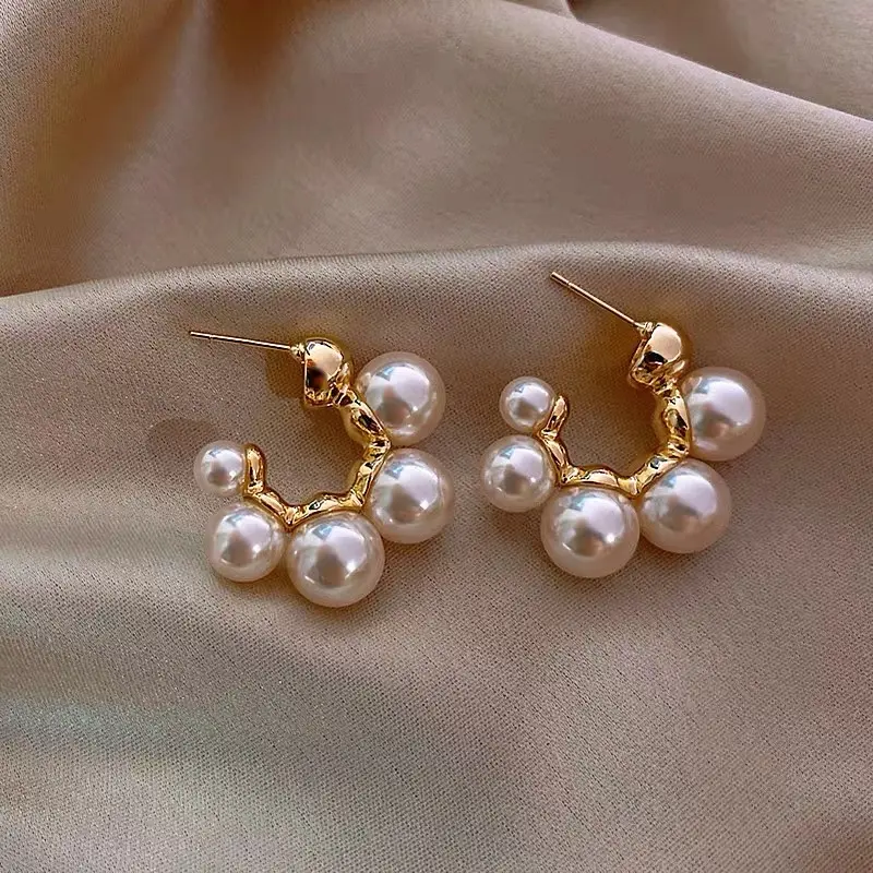 Gold Arc Pearl Stud Earring — Earring pearls from Mowey Studio