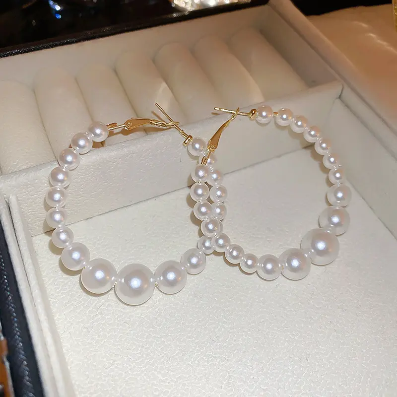 White Graduated Hoop Pearl Stud Earring — front view