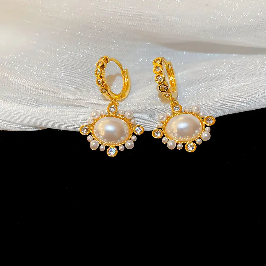 Gold Sunburst Crystal Pearl Clip-on Earring — front view
