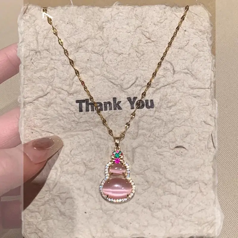 Gold Pink Gourd Cat Eye Pendant Necklace — front view