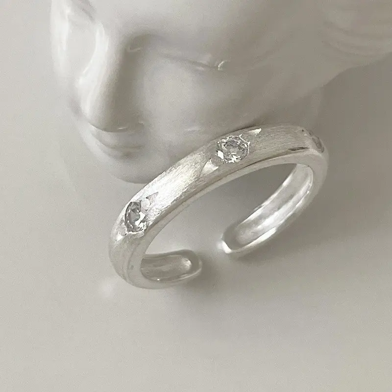 Scattered CZ Wide Brushed Silver Ring — front view