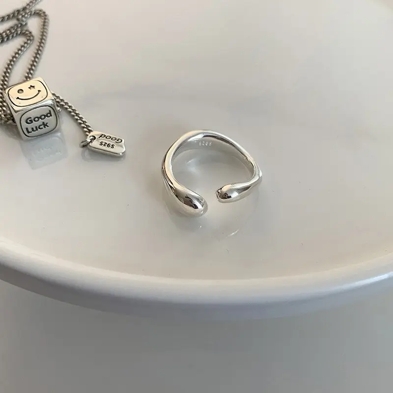 Smooth Teardrop Arc Silver Ring — front view