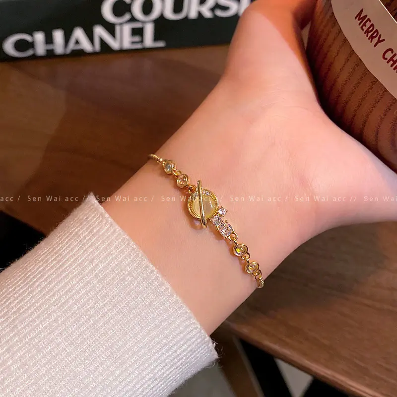 Gold Cat's Eye Planet Zircon Chain Bracelet — front view
